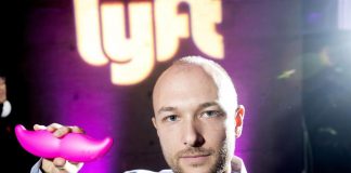 Logan Green a man with a pink mustache